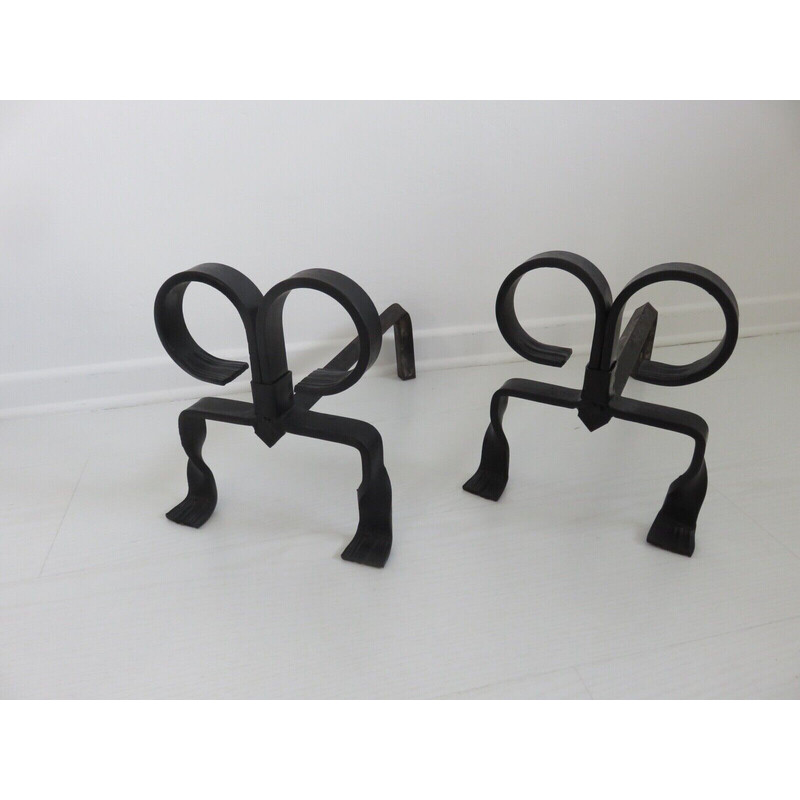 Pair of vintage "ibex" andirons in wrought iron, France 1930-1940s