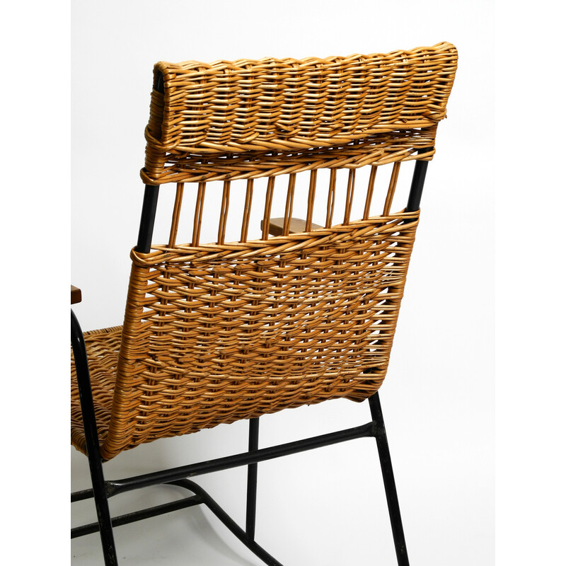 Mid century rocking chair in black painted metal and rattan