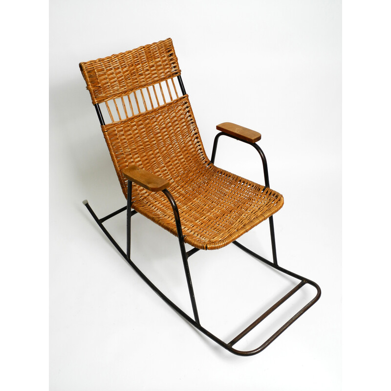 Mid century rocking chair in black painted metal and rattan