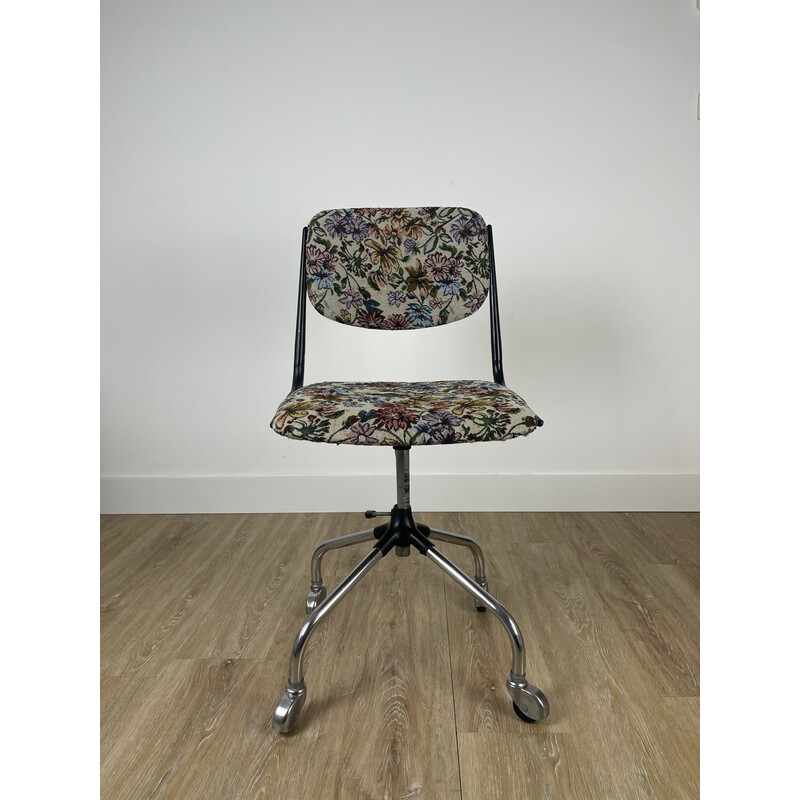 Vintage office chair on wheels