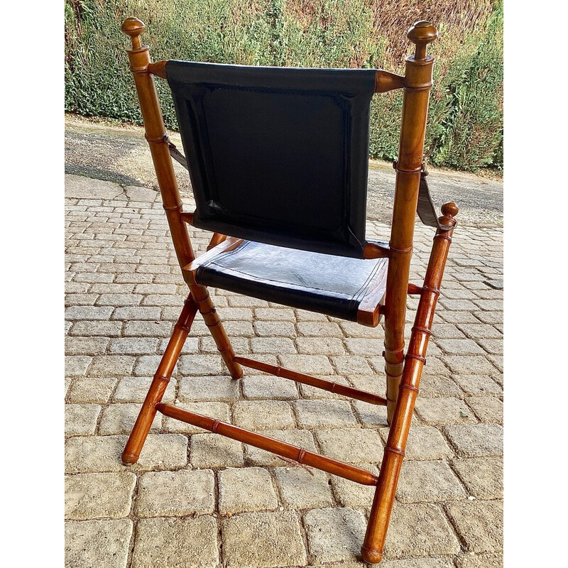 Vintage colonial armchair in teak and leather