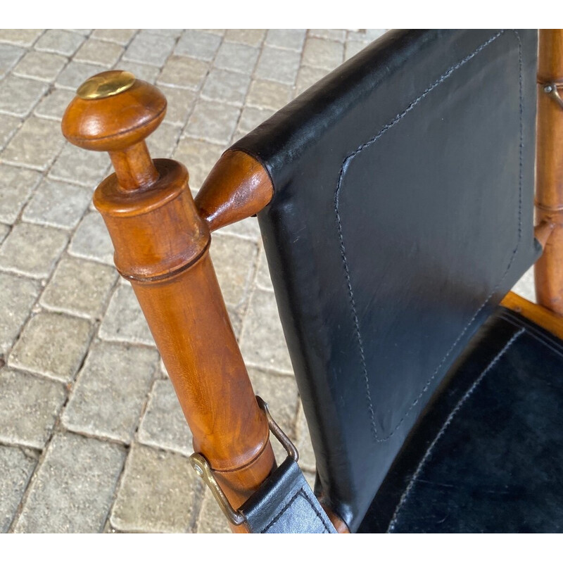 Vintage colonial armchair in teak and leather