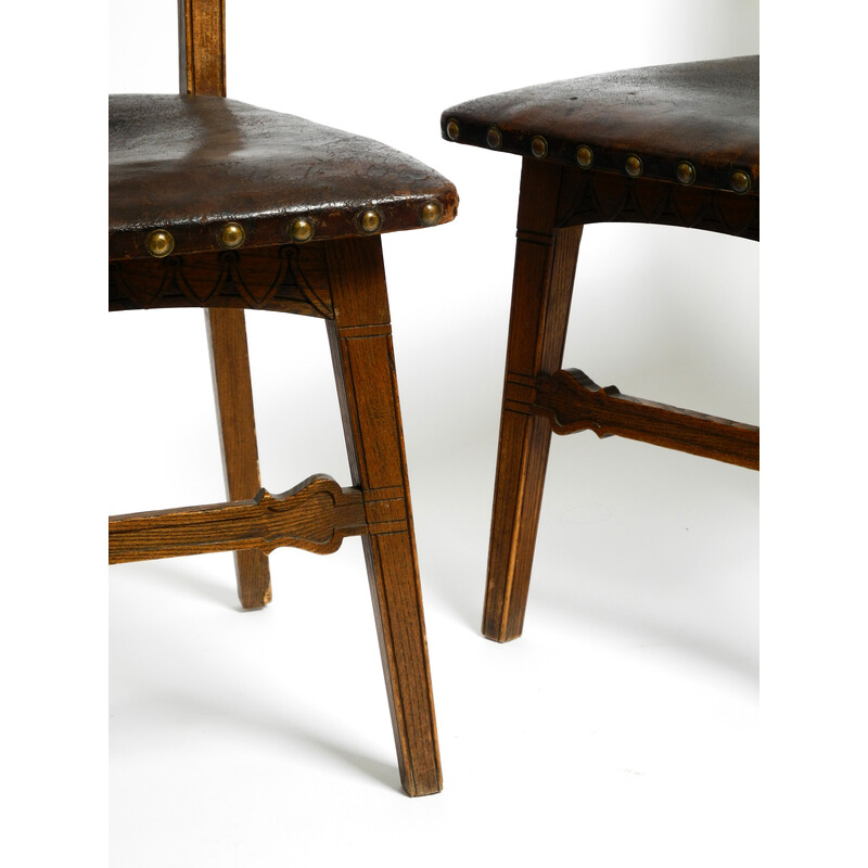 Pair of vintage Art Nouveau oakwood and leather chairs, 1900