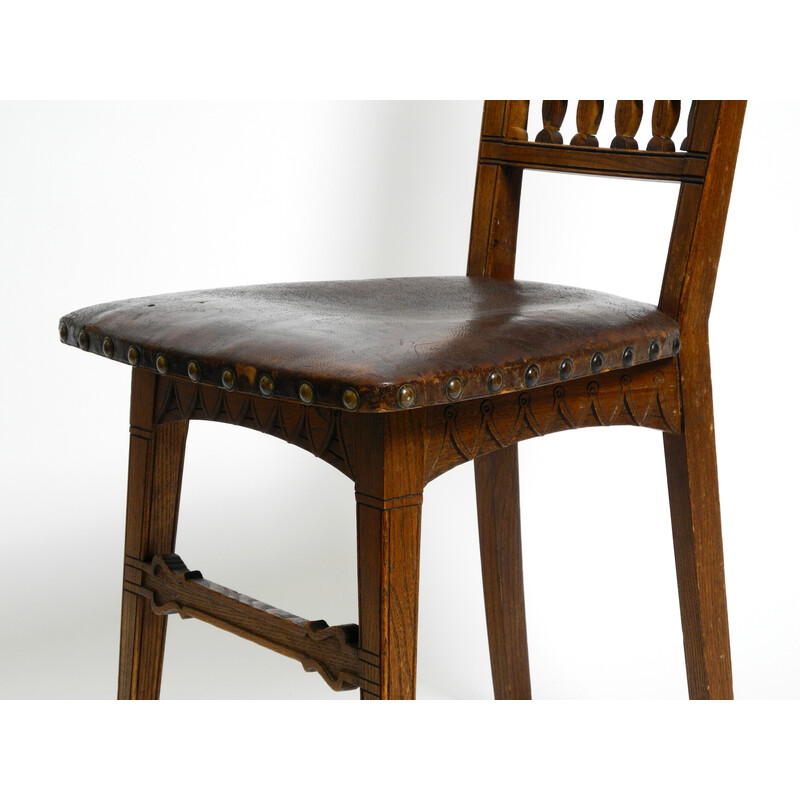 Pair of vintage Art Nouveau oakwood and leather chairs, 1900