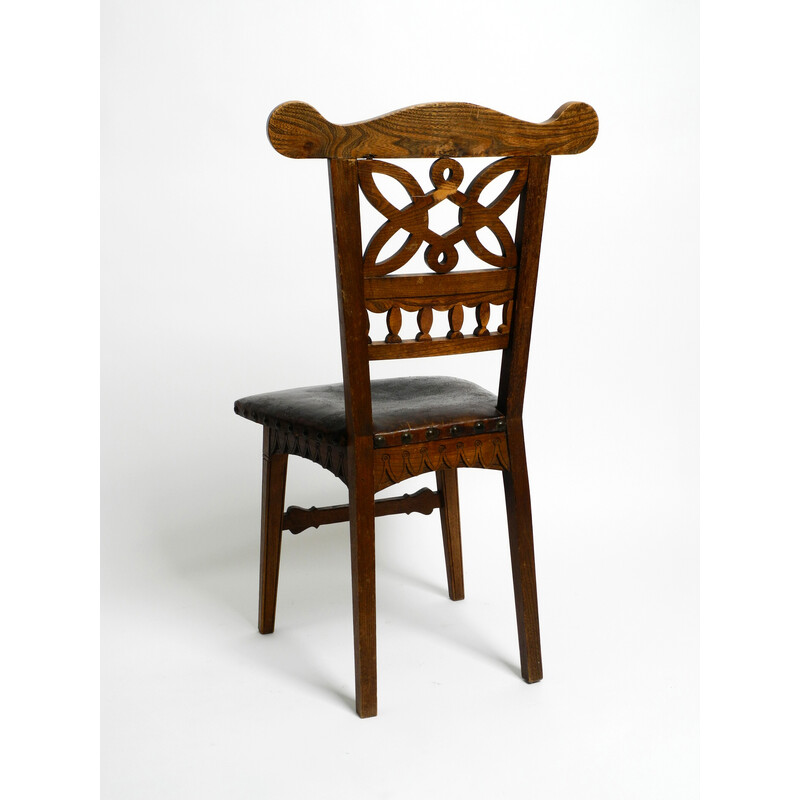 Pair of vintage Art Nouveau oakwood and leather chairs, 1900