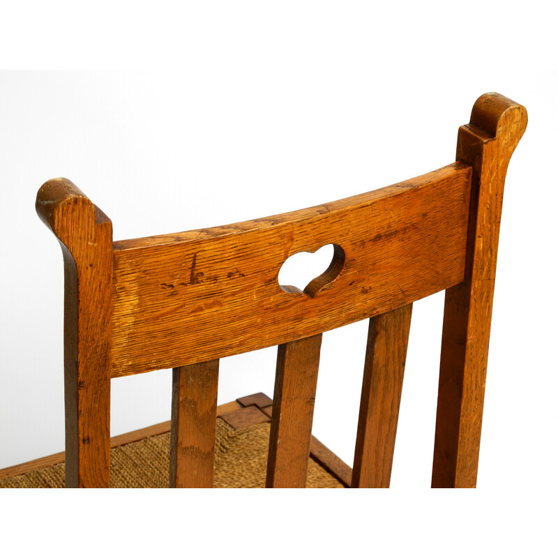 Coppia di sedie vintage in legno di quercia con piedini a slitta e sedute in vimini