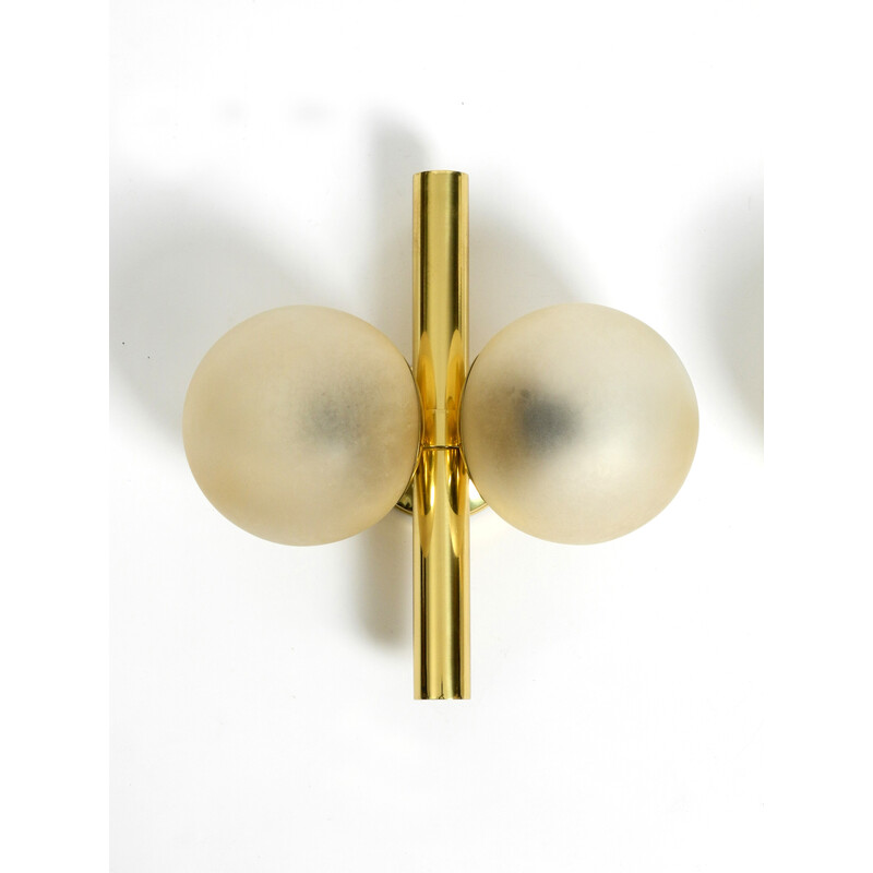 Pair of vintage Kaiser brass wall lamps with two golden glass spheres, 1960s