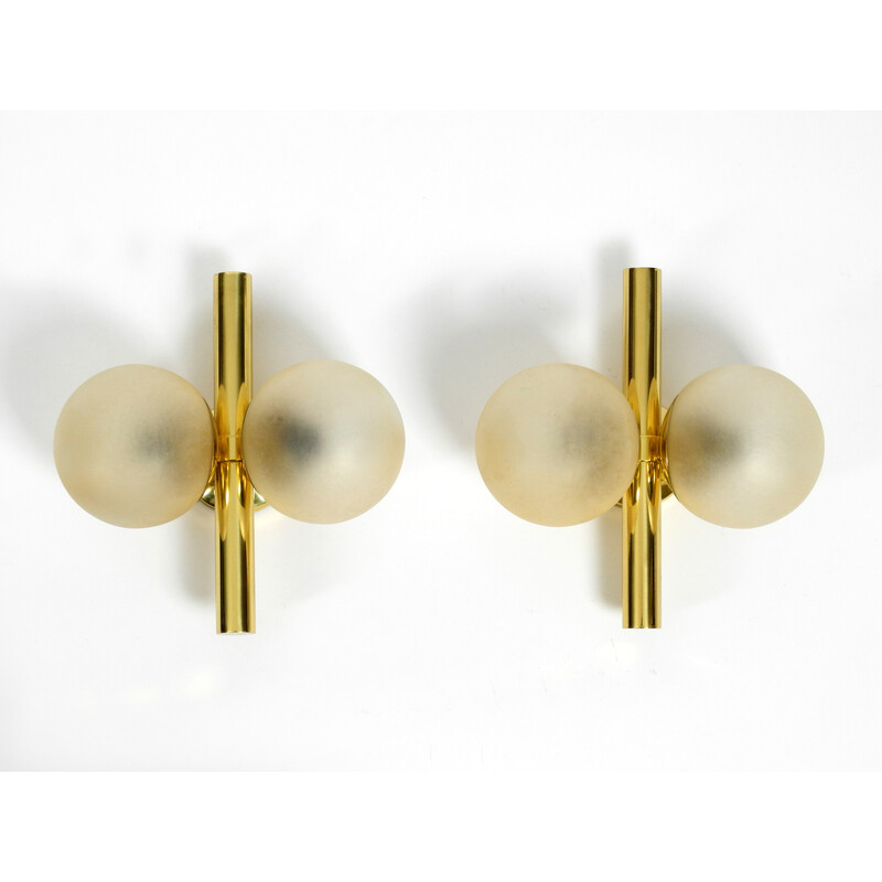 Pair of vintage Kaiser brass wall lamps with two golden glass spheres, 1960s