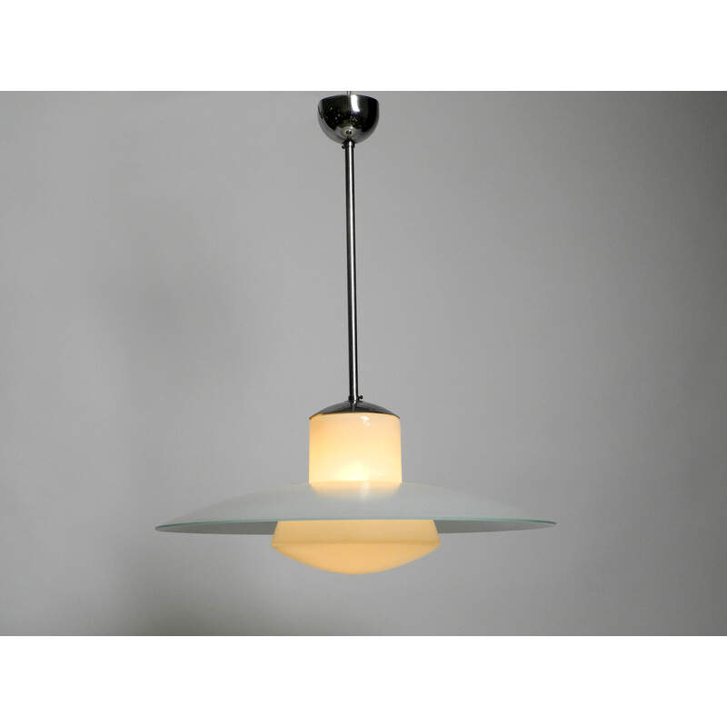 Mid century double glass pendant lamp by Wilhelm Braun Feldweg for Doria