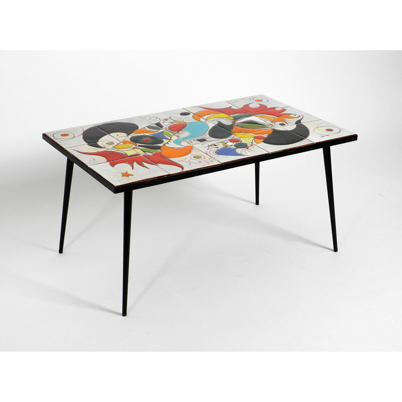 Mid century Italian iron coffee table with tiled top and abstract motif