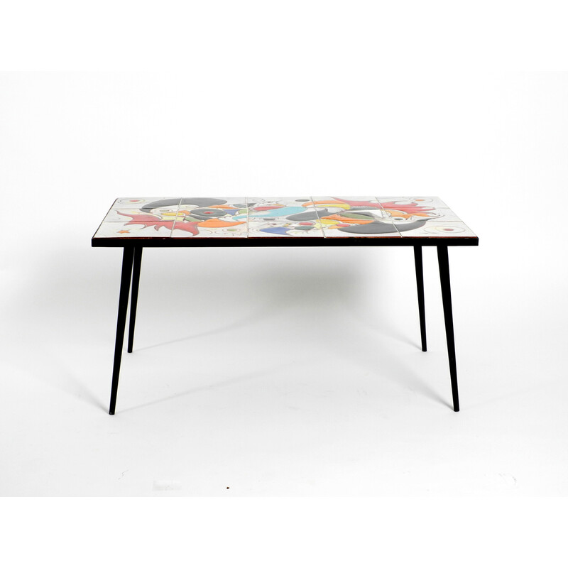 Mid century Italian iron coffee table with tiled top and abstract motif