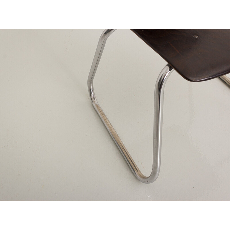 Vintage children's chair with chromed metal legs