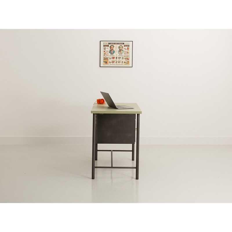 Vintage metal desk in pistachio green