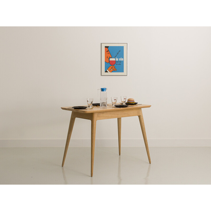 Vintage table with compass legs in local solid oakwood