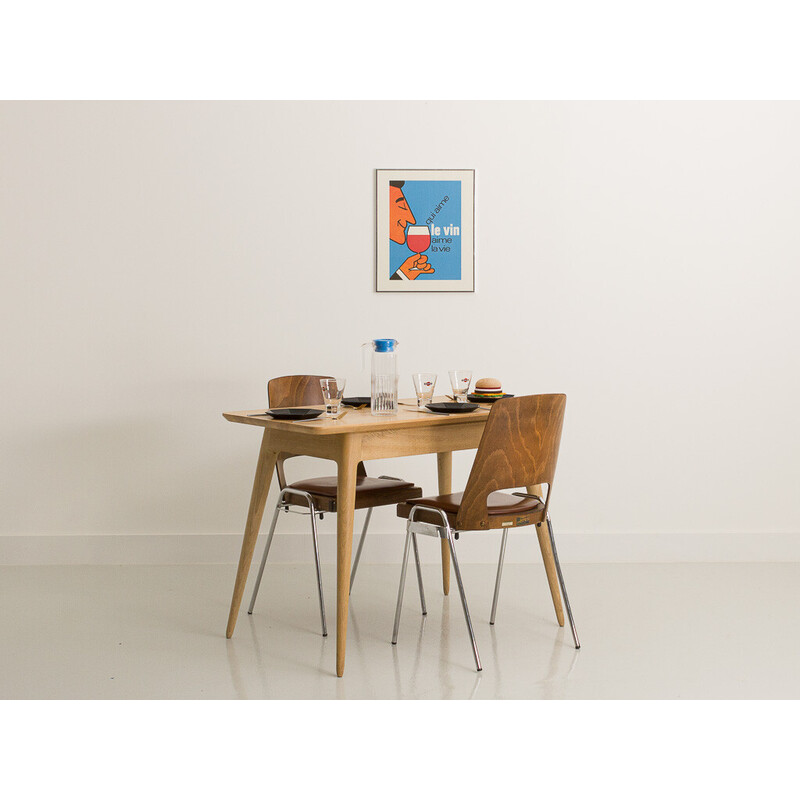 Vintage table with compass legs in local solid oakwood