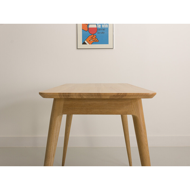 Vintage table with compass legs in local solid oakwood