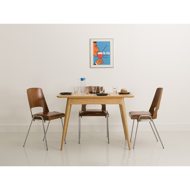 Vintage table with compass legs in local solid oakwood