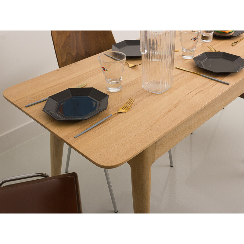 Vintage table with compass legs in local solid oakwood