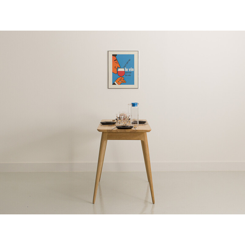 Vintage table with compass legs in local solid oakwood