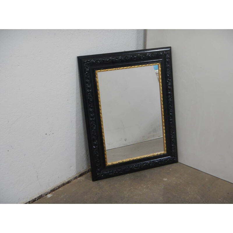 Vintage black and gold wood mirror