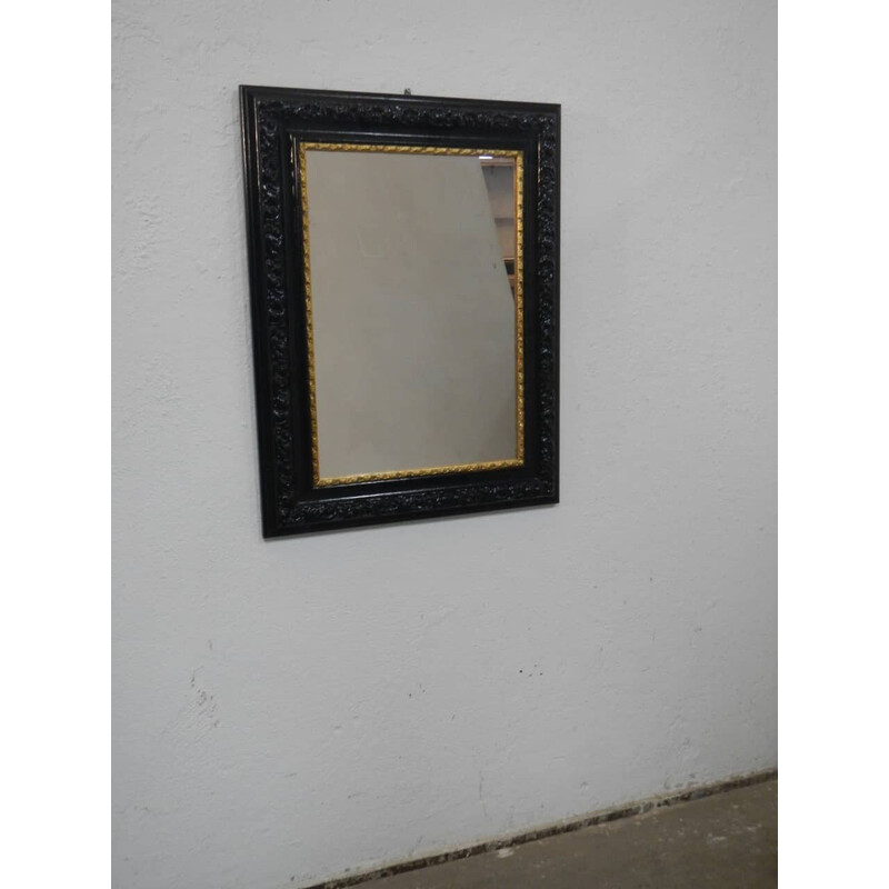 Vintage black and gold wood mirror