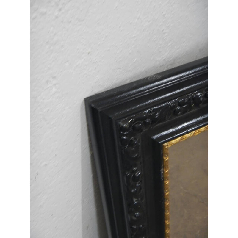 Vintage black and gold wood mirror