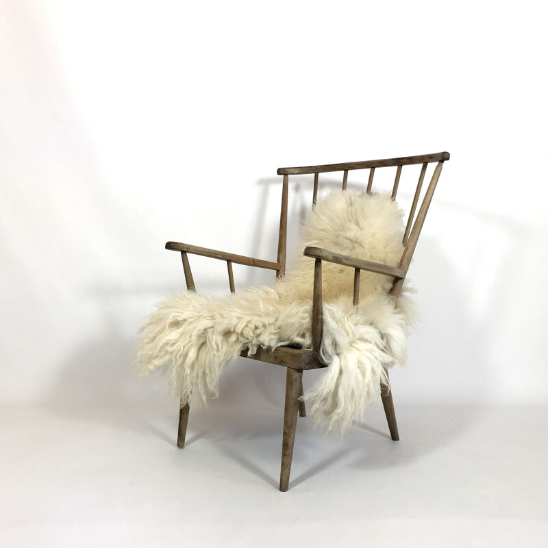 Fauteuil en bois massif grisé par le temps - 1960