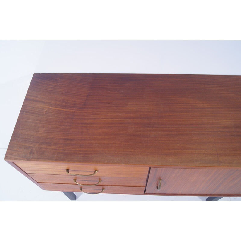 Vintage teak chest of drawers on black metal feet