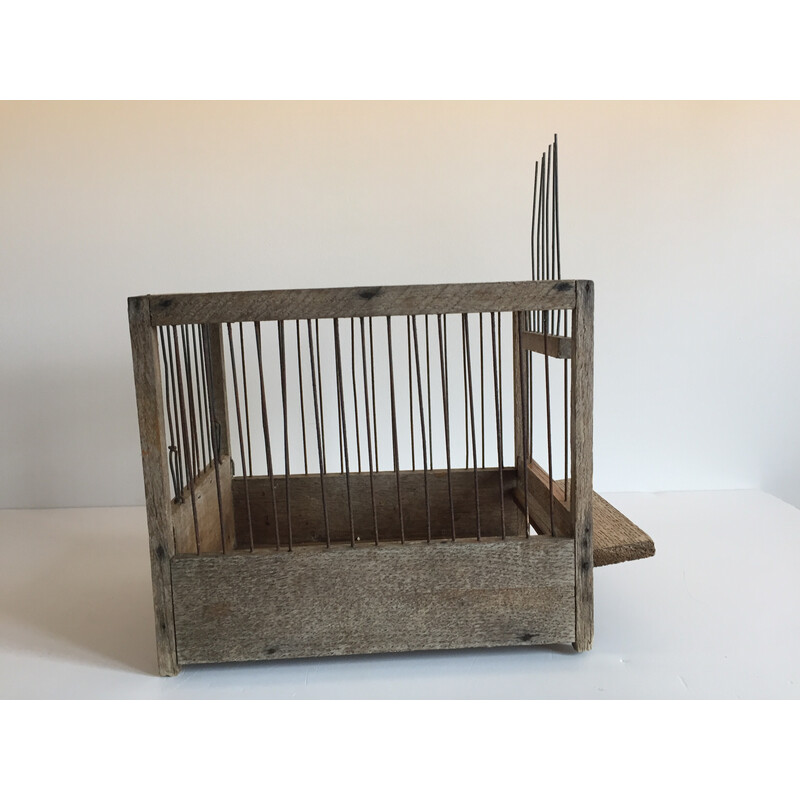 Vintage birdcage in wood and steel