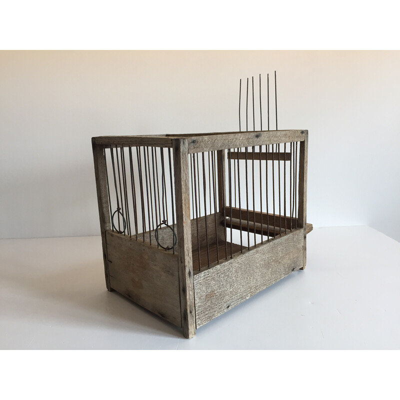 Vintage birdcage in wood and steel