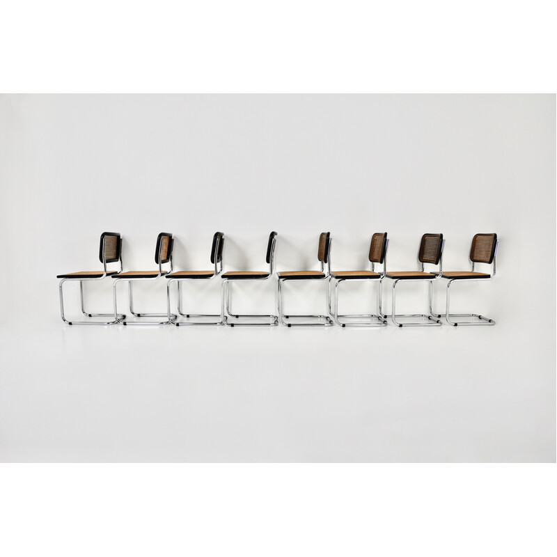 Conjunto de 8 cadeiras pretas vintage em metal, madeira e rotim de Marcel Breuer