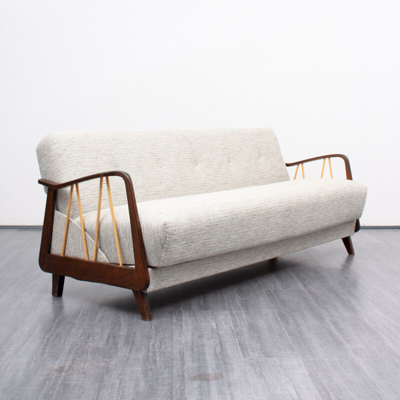 3-seater Sofa bed with stylized armrest in solid wood - 1950s