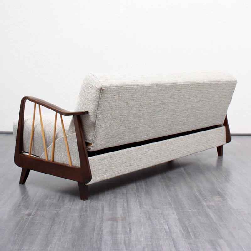 3-seater Sofa bed with stylized armrest in solid wood - 1950s