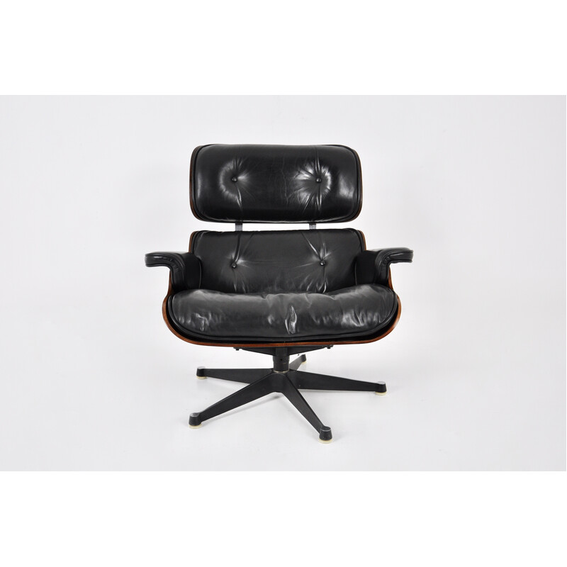 Vintage zwart leer en houten fauteuil van Charles en Ray Eames voor Icf Herman Miller, 1970