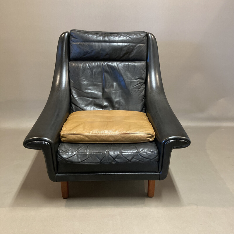 Scandinavian vintage armchair in black leather and teak by Aage Christiansen, 1950