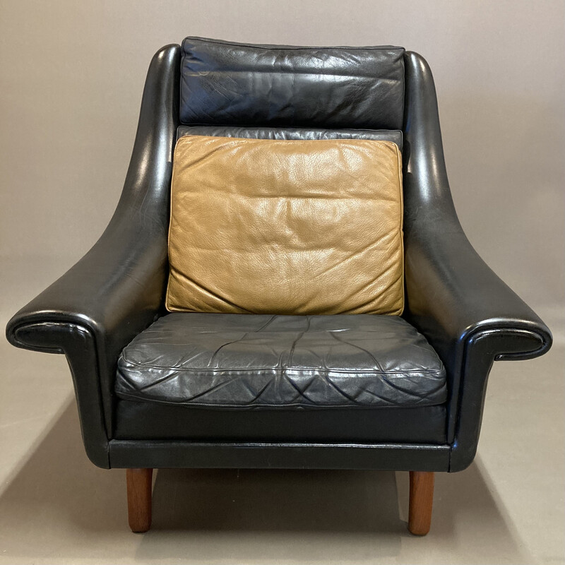 Scandinavian vintage armchair in black leather and teak by Aage Christiansen, 1950