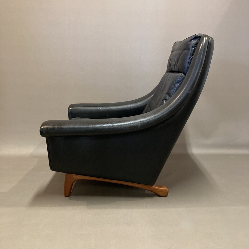 Scandinavian vintage armchair in black leather and teak by Aage Christiansen, 1950