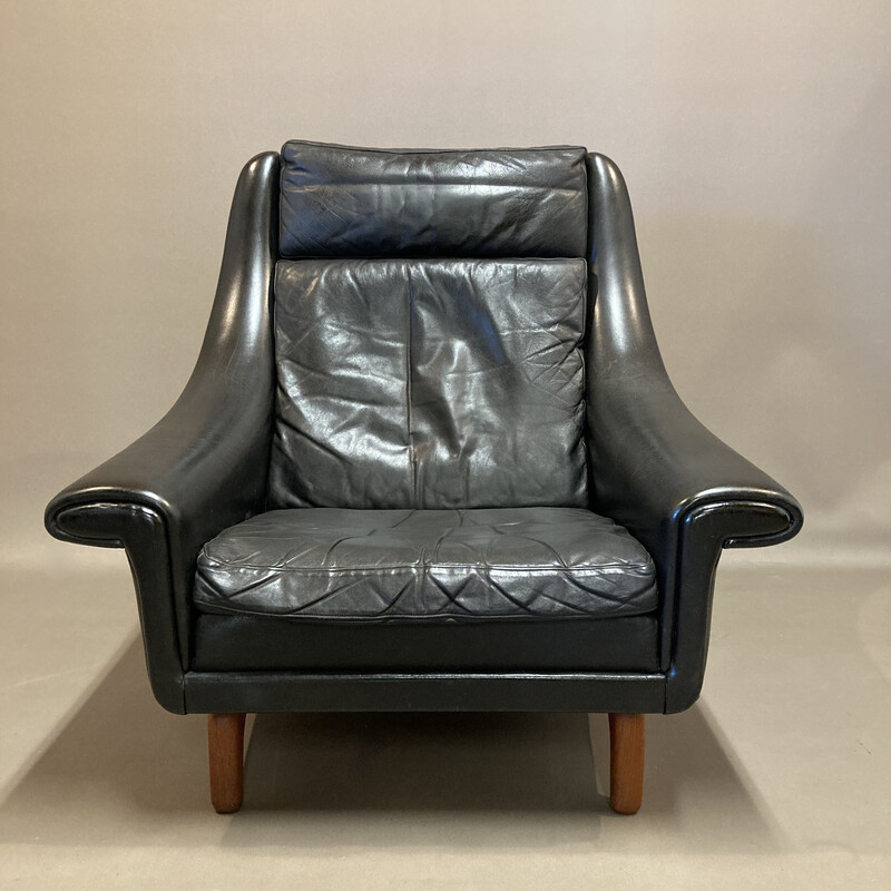 Scandinavian vintage armchair in black leather and teak by Aage Christiansen, 1950