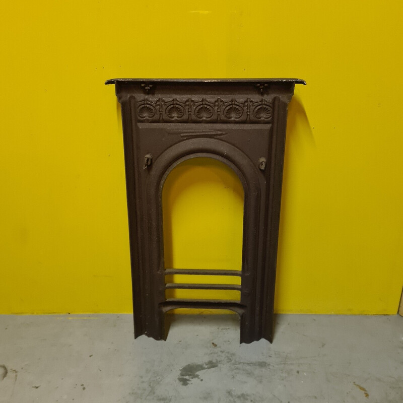 Vintage cast iron fireplace front with shell motif