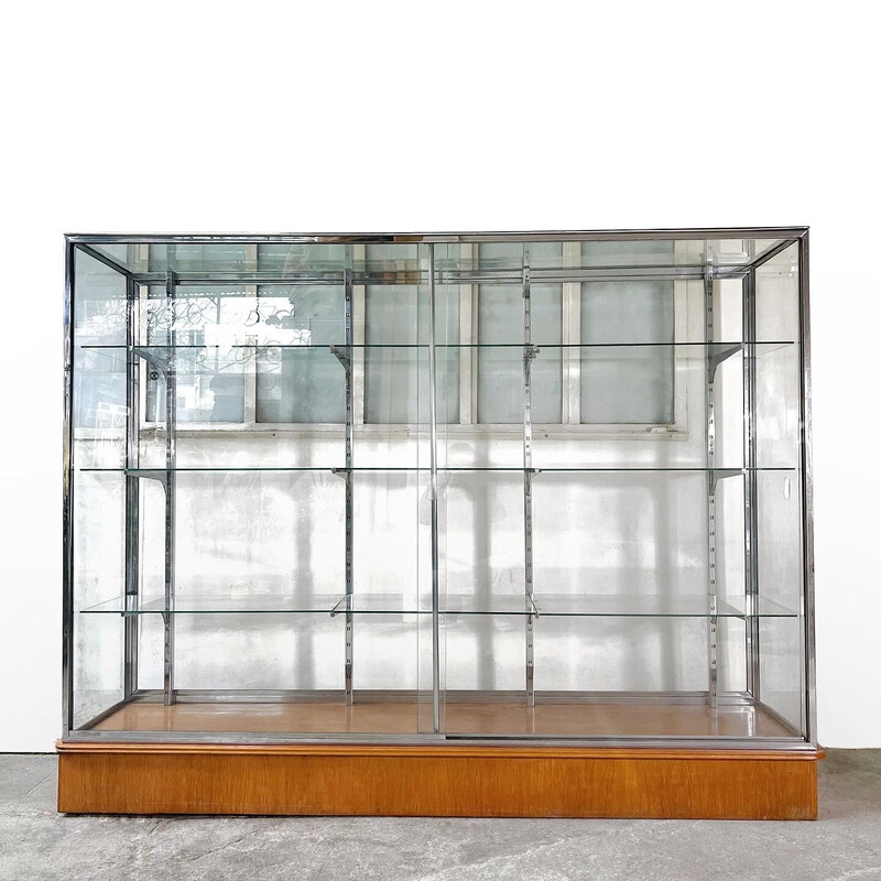 Vintage glass and chrome display cabinet, 1980