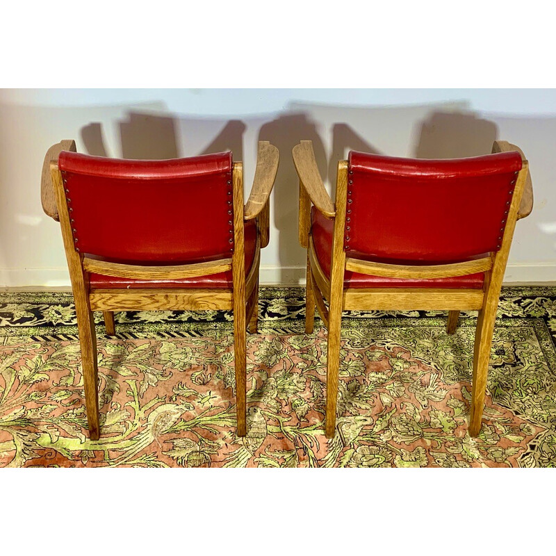 Paire de fauteuils vintage en chêne et skaï rouge par Maurice Jallot