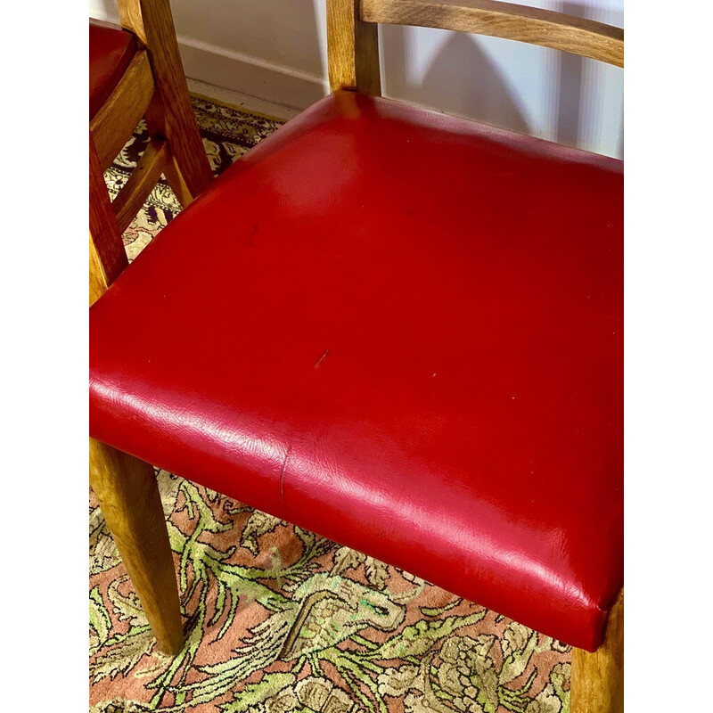 Pair of vintage armchairs in oak and red leatherette by Maurice Jallot