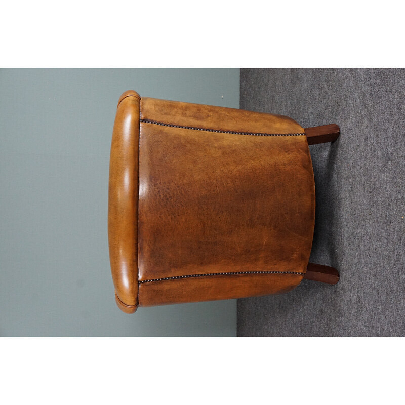 Vintage cognac colored sheep leather club armchair