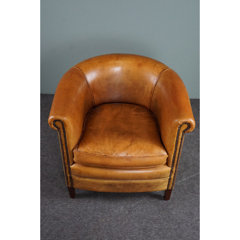 Vintage cognac colored sheep leather club armchair