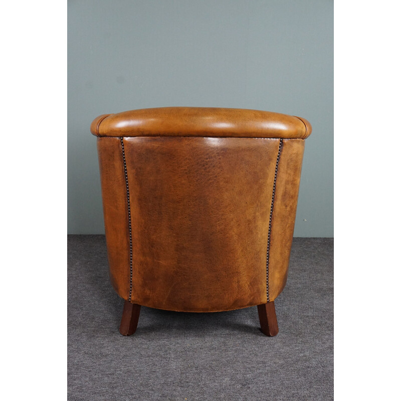 Vintage cognac colored sheep leather club armchair