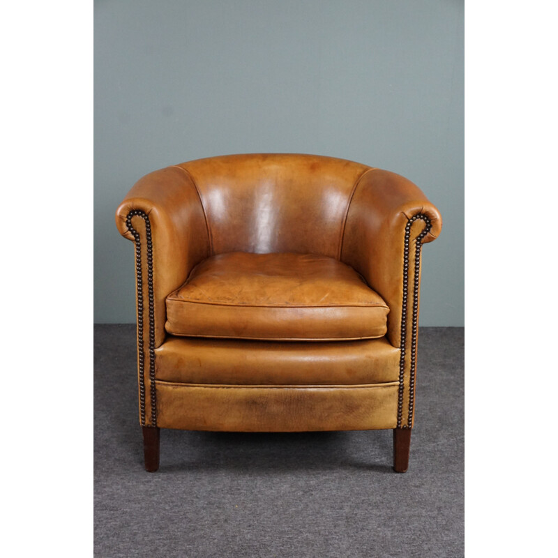 Vintage cognac colored sheep leather club armchair