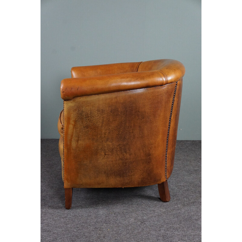 Vintage cognac colored sheep leather club armchair