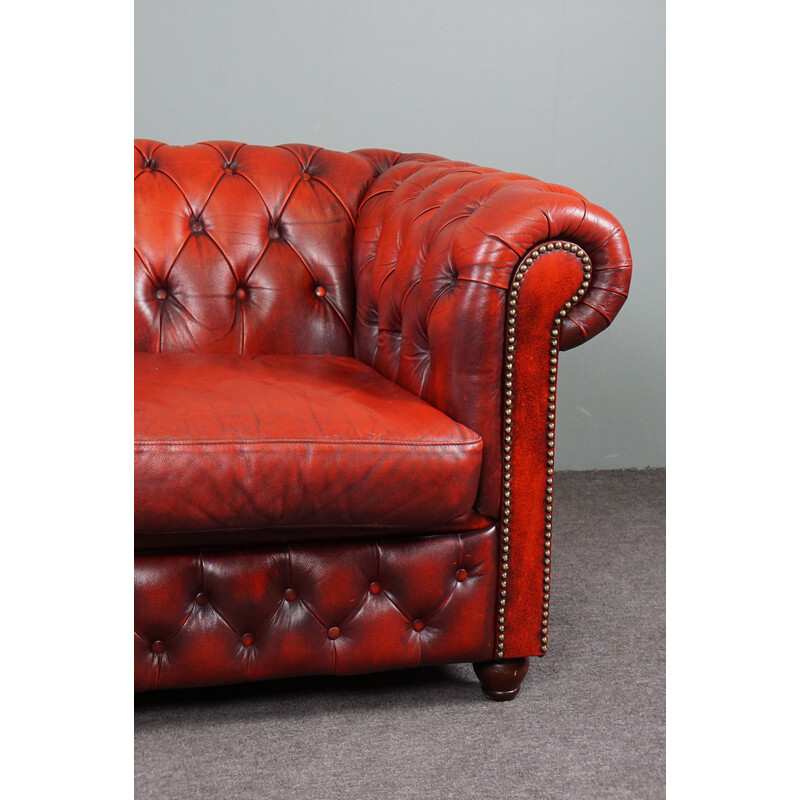 Vintage rood koeienleer Chesterfield bank