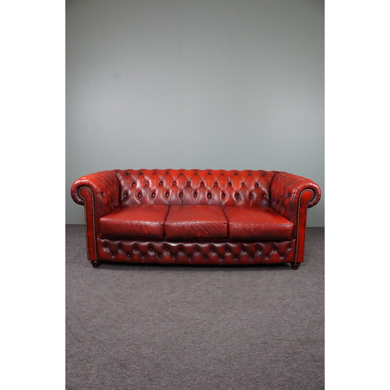 Vintage rood koeienleer Chesterfield bank