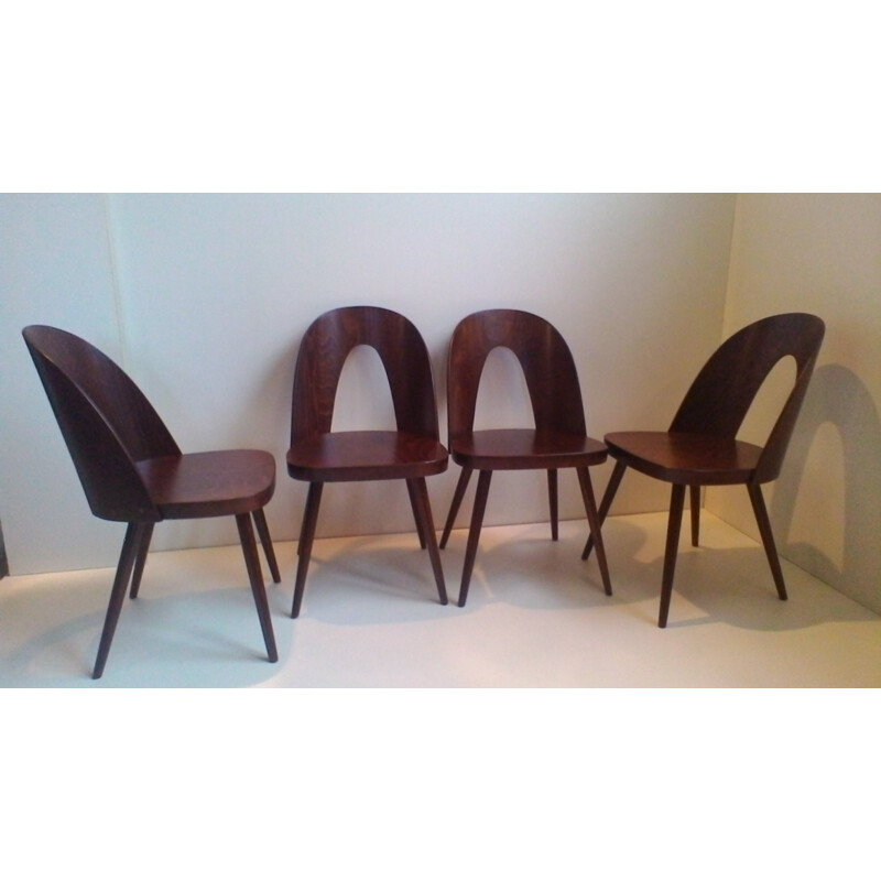 A set of 4 dining chairs in beech by Oswald Haerdtl for Thon - 1960s